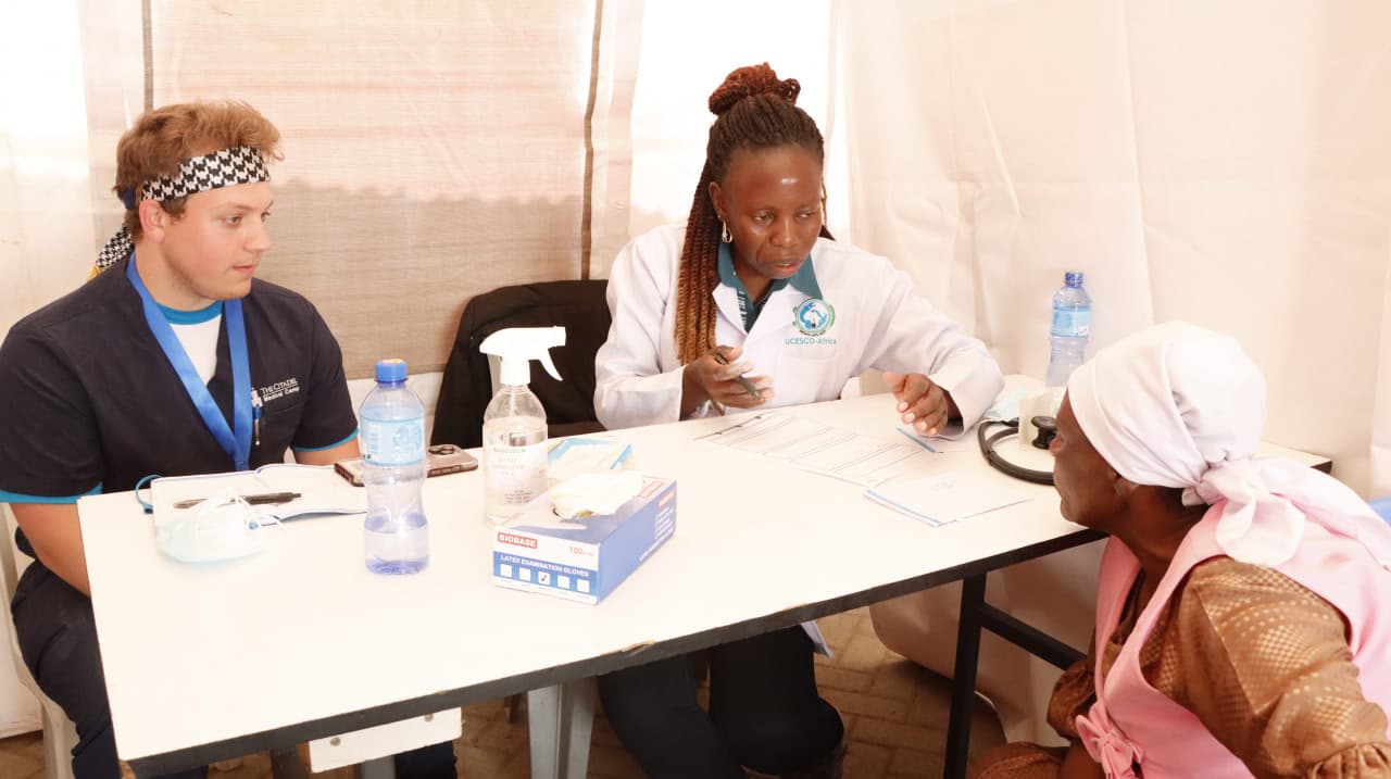 UCESCO doctor with patient consultation