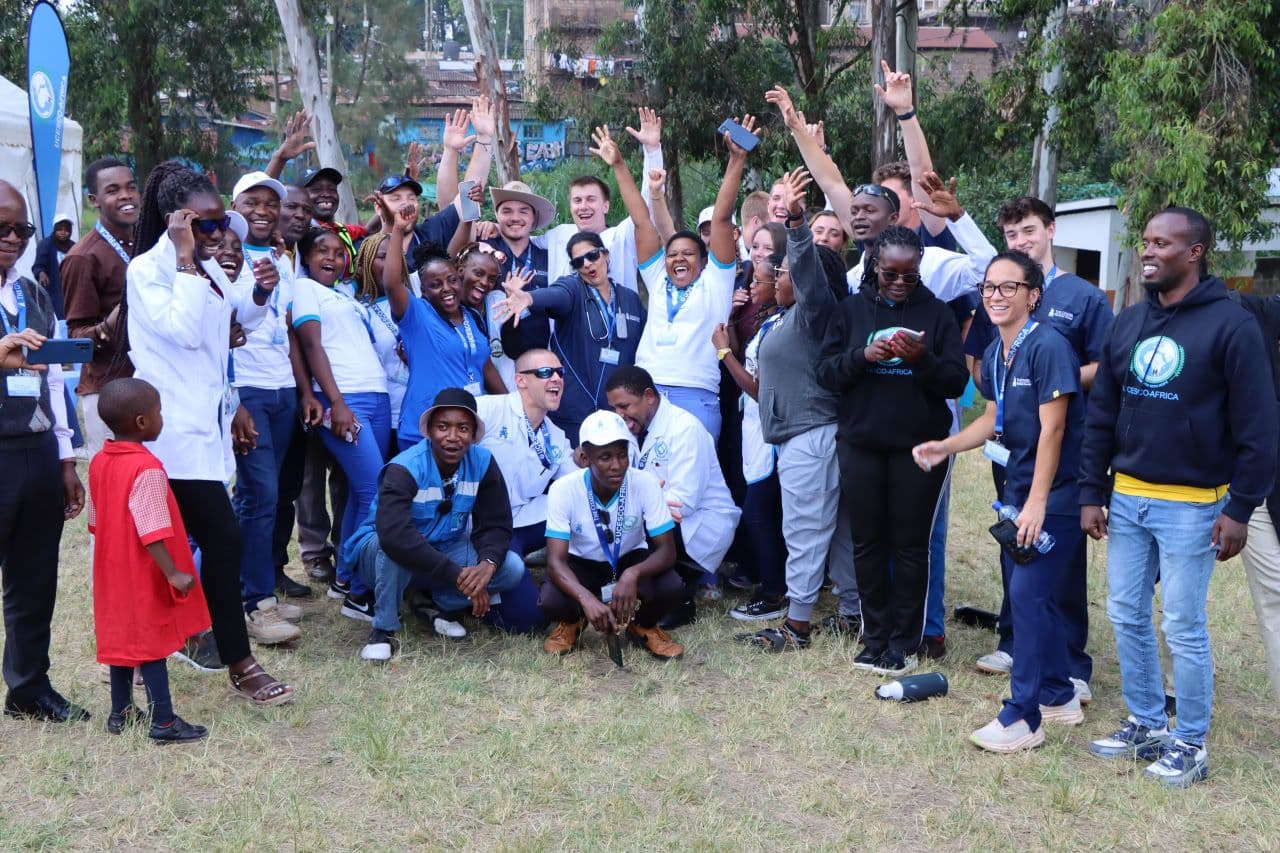 Doctors with patients group photo