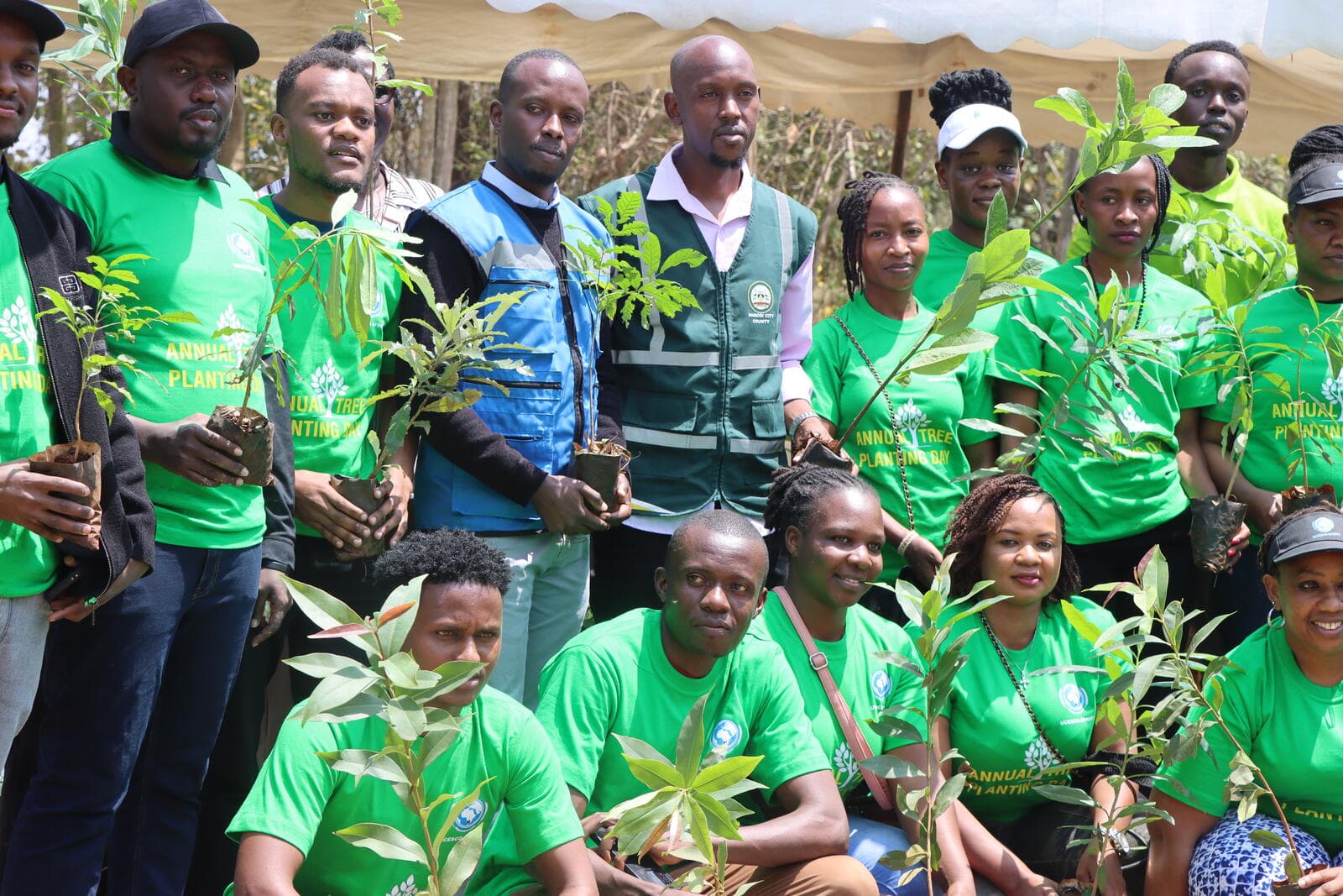 UCESCO staff with branding