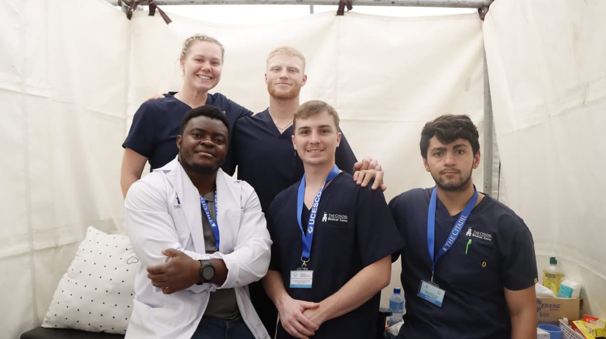 Doctor volunteers in tent